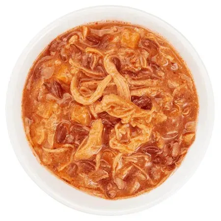 schesir-taste-the-world-adult-pollo-masala-en-caldo-lata-para-perros (1).webp